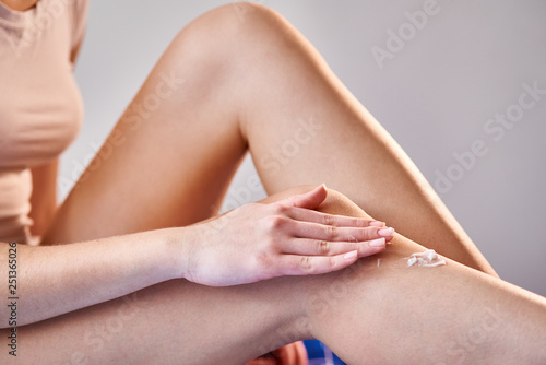 Woman take care of legs