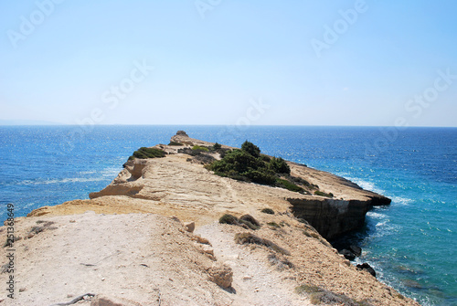 Rocky coast of the bay, Cape Fourni, Rhodes island, Greece © PAVEL