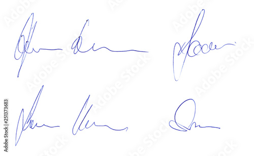 Handwritten signature concept of signed document with ballpoint pen isolated on white background of matt photographic paper photo