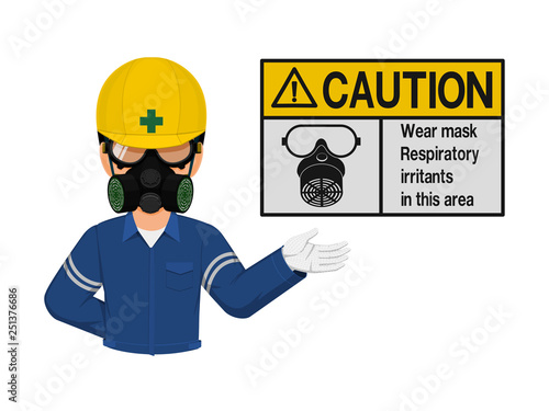 Industrial worker is presenting gas mask sign