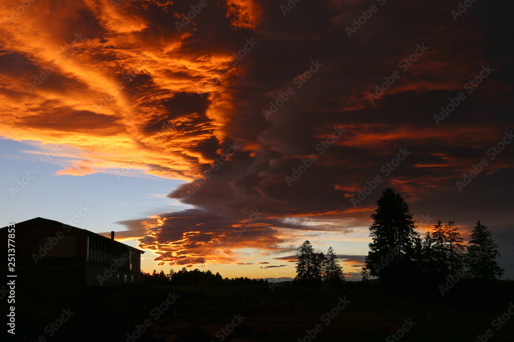 Red evening. The sky is on fire. Amazing clouds.. Dramatic sunset