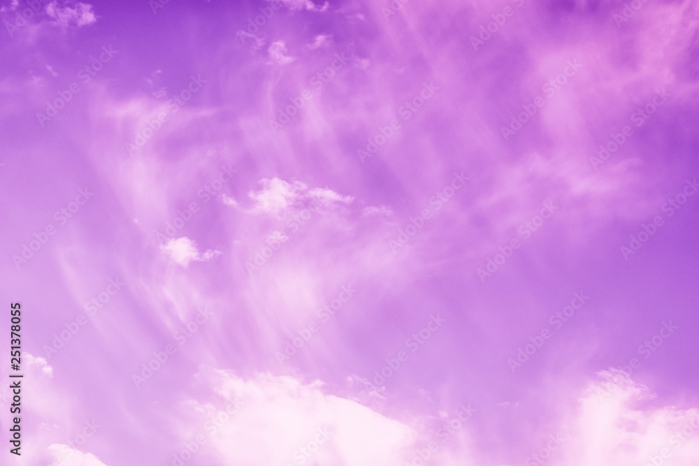 Light violet pink sky background. Beautiful sky with white clouds
