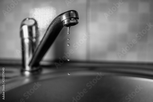 Water is dripping from tap