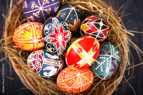 Easter eggs in a basket close-up.