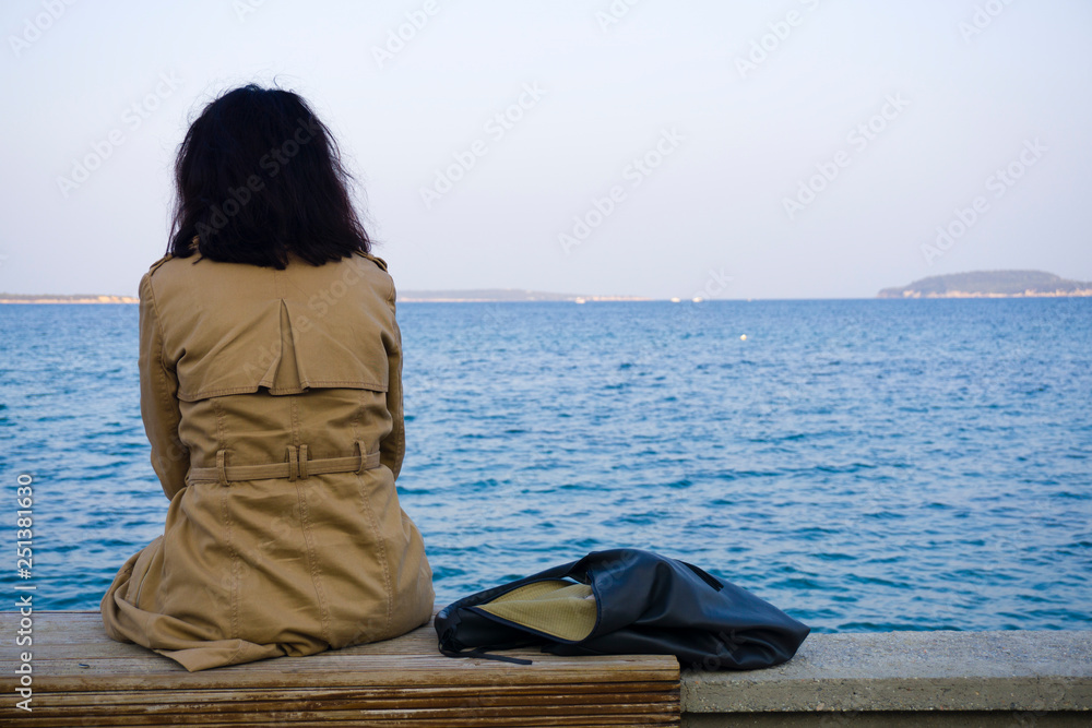 Unhappy Girl Feeling Sad On The Beach Stock Photo, Picture and