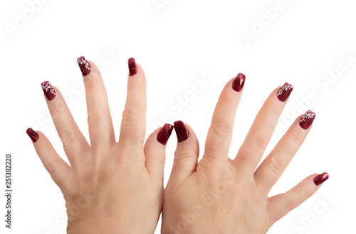 Female hands with manicure on a white background