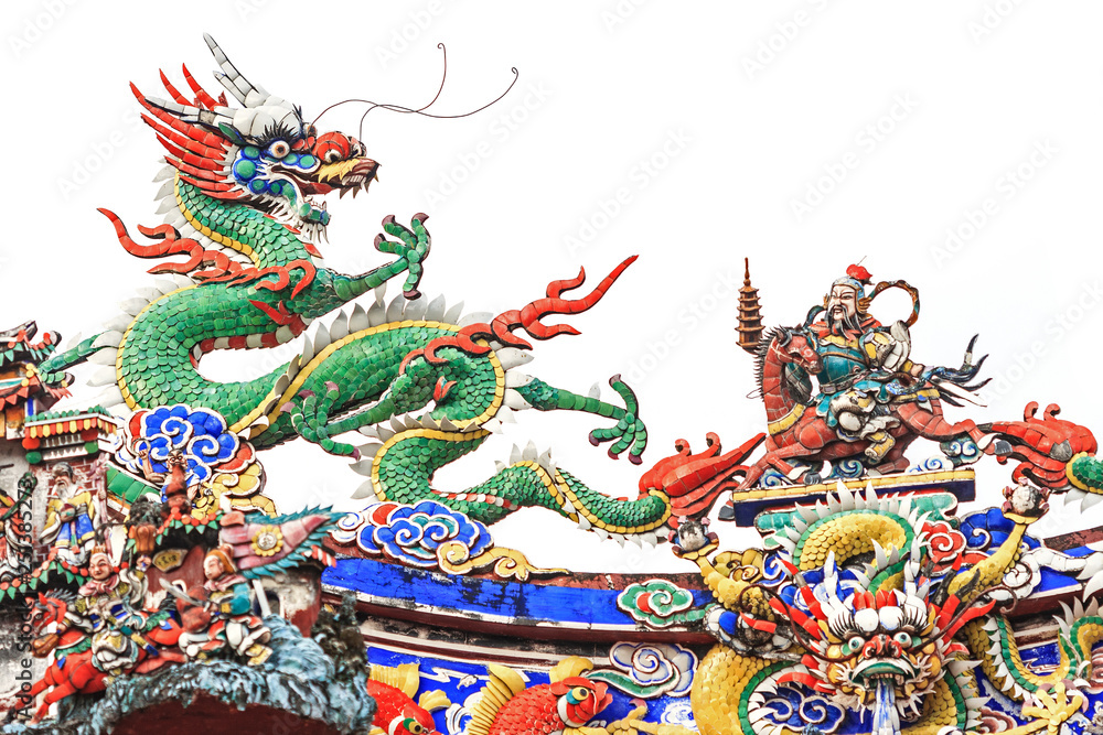 Fototapeta premium Beautiful chinese dragon sculpture on the isolated on white background. Decorative roof in Chinese temples. Shrine exterior decoration.