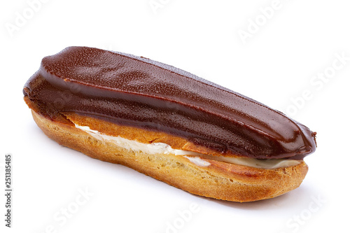 Traditional french dessert. Isolated eclair with custard and chocolate icing on white background. Sweet pastry products