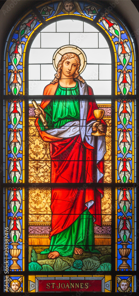 PRAGUE, CZECH REPUBLIC - OCTOBER 13, 2018: The apostle Saint John the Evangelist the Evangelist in the stained glass of the church kostel Svatého Václava  (end of 19. cent).