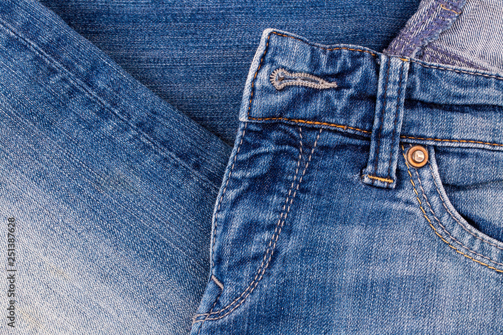 Blue jeans fabric. Denim jeans texture or denim jeans background. Blue jeans fabric. Denim jeans texture or denim jeans background.
