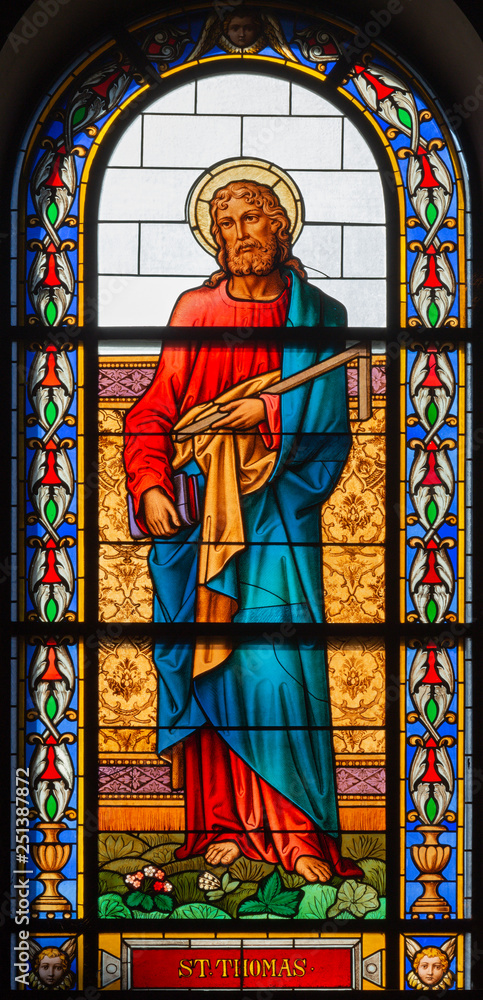PRAGUE, CZECH REPUBLIC - OCTOBER 13, 2018: The apostle Saint Thomas the Evangelist in the stained glass of the church kostel Svatého Václava  (end of 19. cent).
