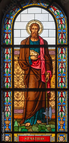 Fotografija PRAGUE, CZECH REPUBLIC - OCTOBER 13, 2018: The apostle Saint Matthias the Evangelist in the stained glass of the church kostel Svatého Václava  (end of 19