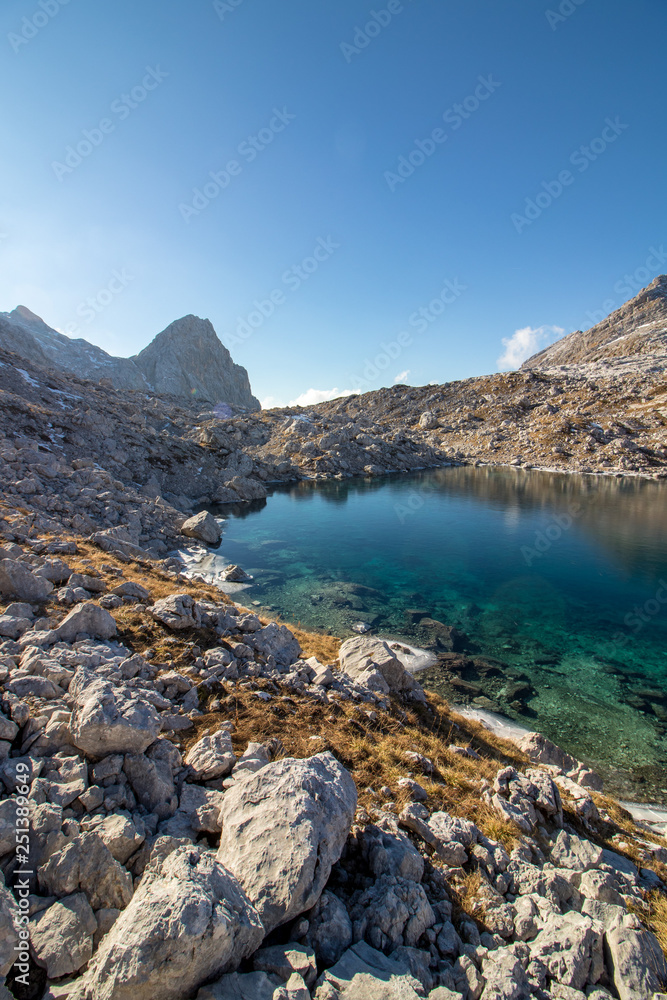 one of Triglav lakes on a sunny clear sky
