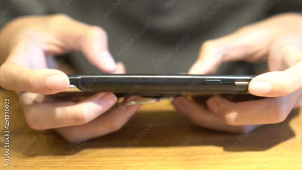 Close up for boy hand play games .Concept the focus on screen for a long time is harmful to the eyes. Close up for boy hand play games .Concept the focus on screen for a long time is harmful to the eyes.