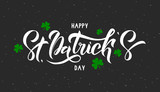 Happy St. Patrick Day lettering on grey background with green trefoils. Beautiful Vector illustration for greeting card/poster/banner template.