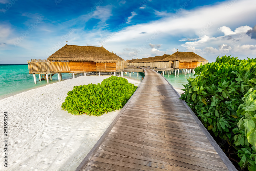 Wooden jetty and cabins on Maldives.