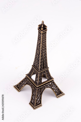 Fototapeta Naklejka Na Ścianę i Meble -  Miniatur Eiffel Tower Paris isolated. Travel concept photo.