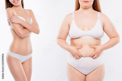 Two young women with different body types photo