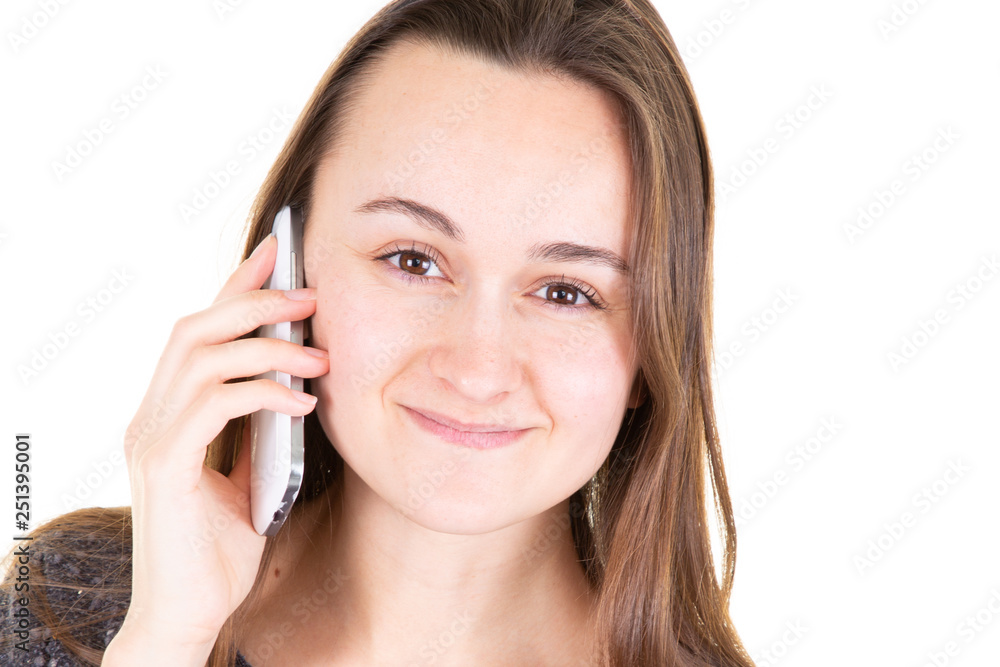 Young beautiful girl is speaking at her smartphone Young beautiful girl is speaking at her smartphone