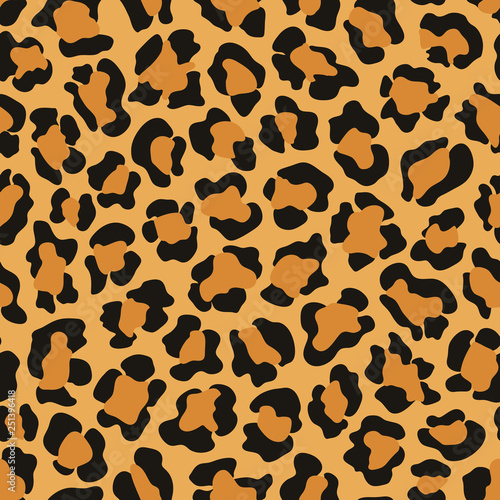 Leopard animal print vector seamless pattern background in black, brown and orange colors for fashion and textile, home decor, wrapping paper, scrapbooking and other projects.
