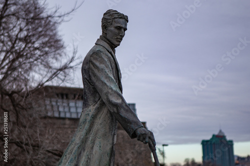 Wallpaper Mural Niagara Falls CANADA - February 23, 2019: Nikola Tesla Sculpture in Queen Victoria Park in Niagara Falls, Canada. The monument was designed by sculptor Les Drysdale and opened in 2006. Torontodigital.ca