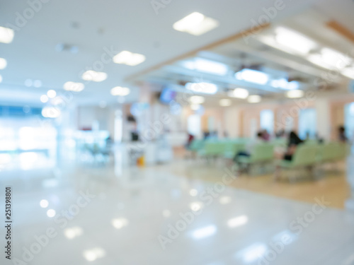 Blur image Background of people in clinic lobby hall at modern hospital to pay money for medical expenses.