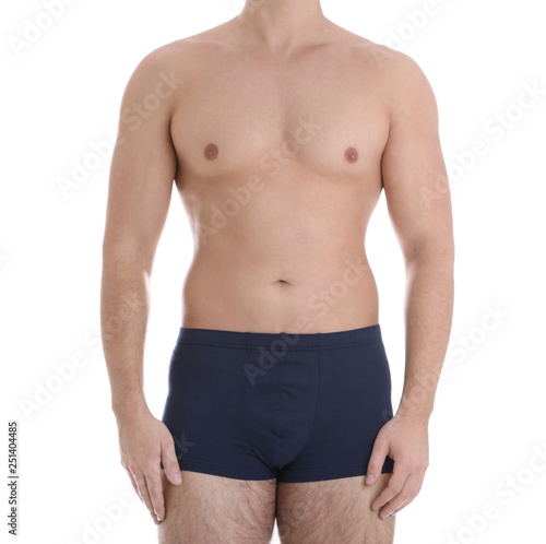 Young athletic man on white background, closeup. Weight loss