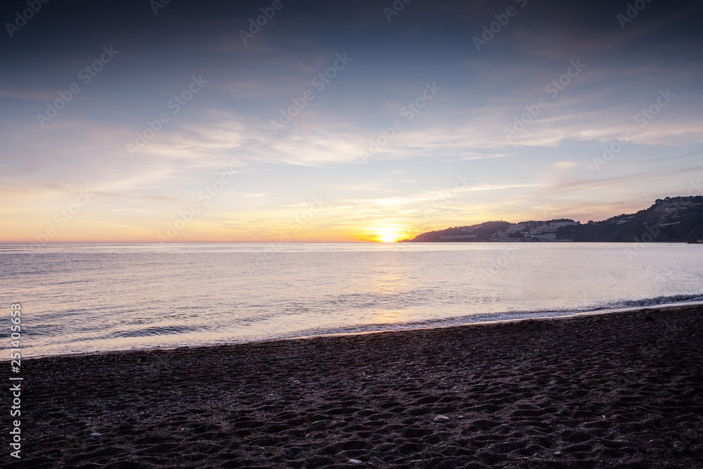 Obraz premium sunset on the beach in almunecar spain