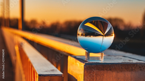 Crystal ball sunset shot with reflections at Plattling-Isar-Bavaria-Germany