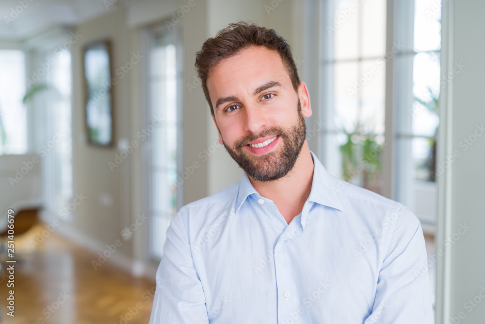 Handsome business man happy face smiling with crossed arms looking at the camera. Positive person. Handsome business man happy face smiling with crossed arms looking at the camera. Positive person.