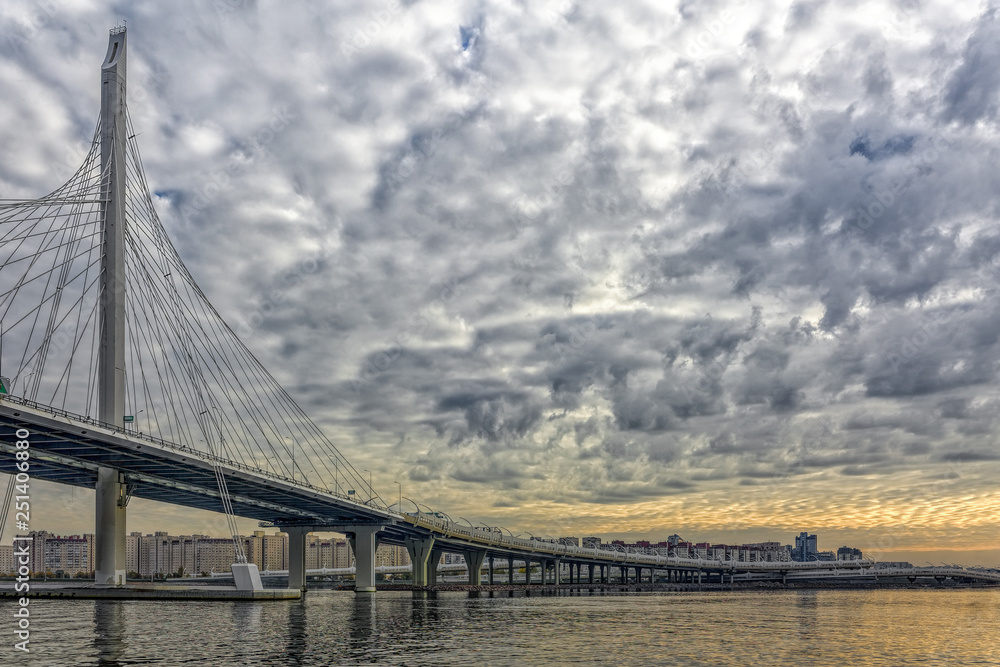 Fototapeta premium Cable-stayed bridge over Neva river on Western Rapid Diameter highway in St. Petersburg, Russia.