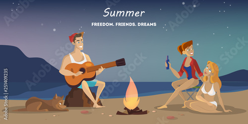 Summer camp on the beach. Touris at the campfire