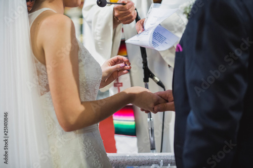 grom and bride getting married photo