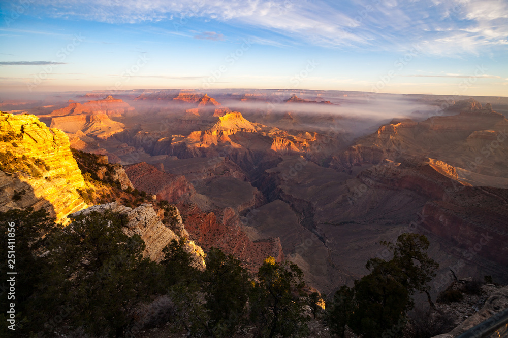 Sunrise Image of the Grand Canyon National Park with early morning haze and fog, Arizona, USA