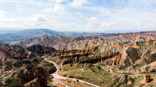 Binggou Danxia Canyon Landform. Road Valley in the Geopark.