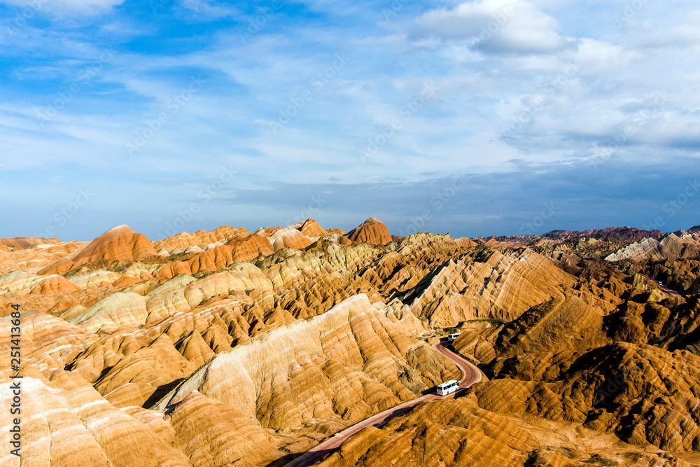 Obraz premium Rainbow Mountains Zhangye Danxia Landform Geological Park in China and Road.