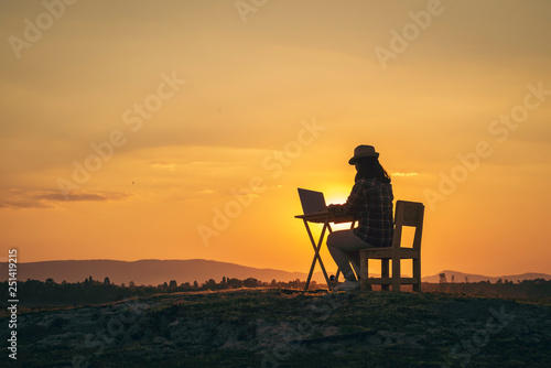 Young woman working in outdoor © Chanchai