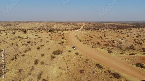 Arid desert landscape of Central Khomas Highland with very steep Gamsberg and Spreetshoogte Pass in Namibia, Aerial drone shot photo