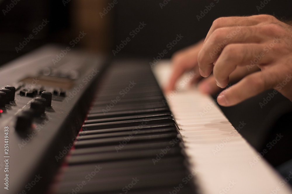 Fototapeta premium hands playing piano