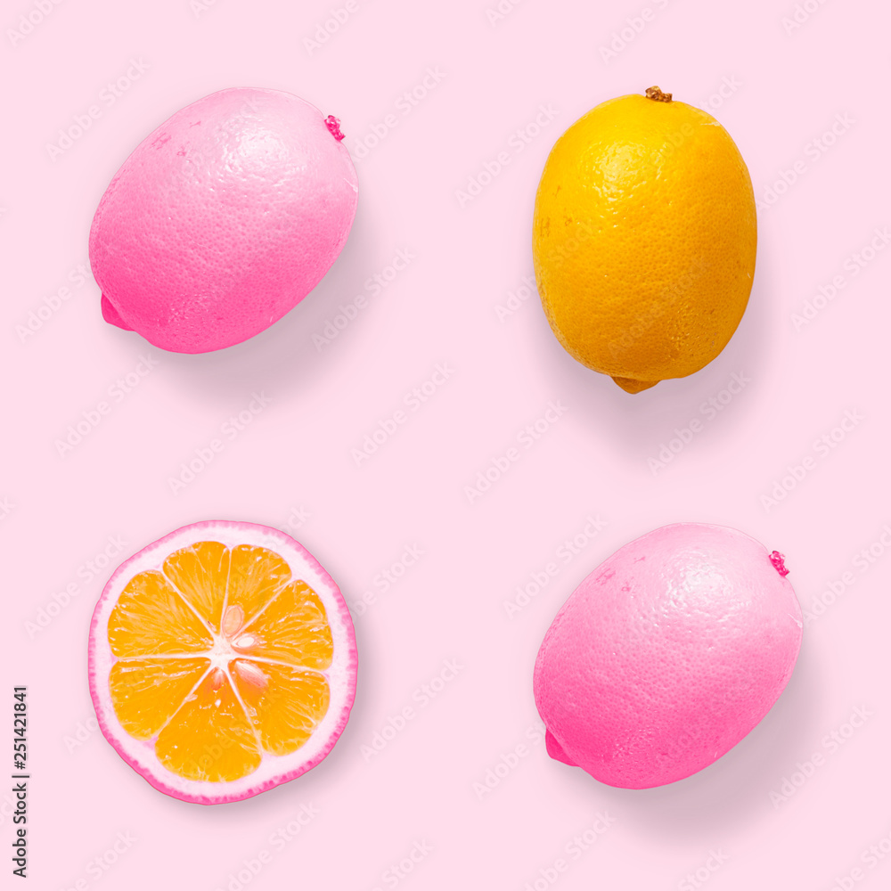 A minimalist design with a dyed pink lemon. Creative summer concept. Creative summer concept. Flat lay.Top view. A minimalist design with a dyed pink lemon. Creative summer concept. Creative summer concept. Flat lay.Top view.