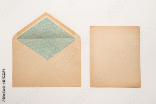 Old envelope and paper on white background
