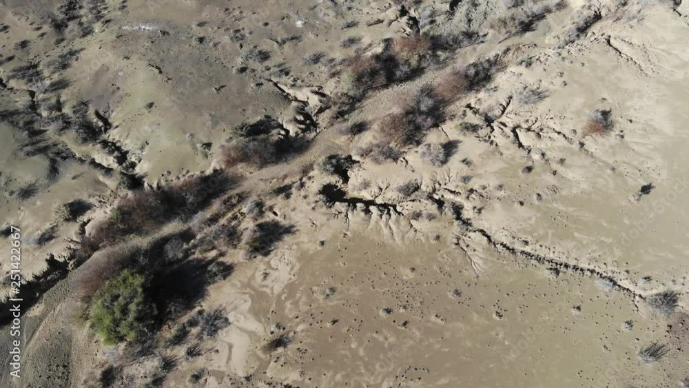 Extremely dry and arid landscape of Southern Namibia with barely any plant growth, Aerial drone shot Extremely dry and arid landscape of Southern Namibia with barely any plant growth, Aerial drone shot