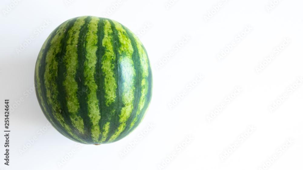 Ripe single full watermelon berry isolated on white background. Ripe single full watermelon berry isolated on white background.