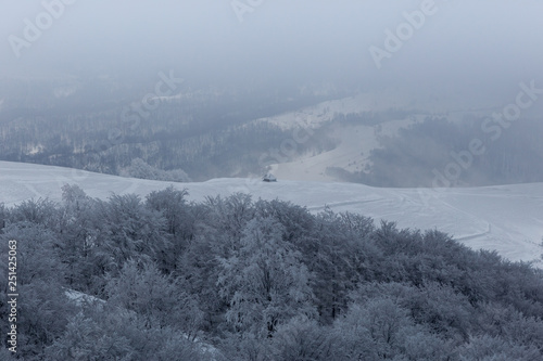 Frozen landscapes on a cold day of winter in Trascaului Mountains, Romania