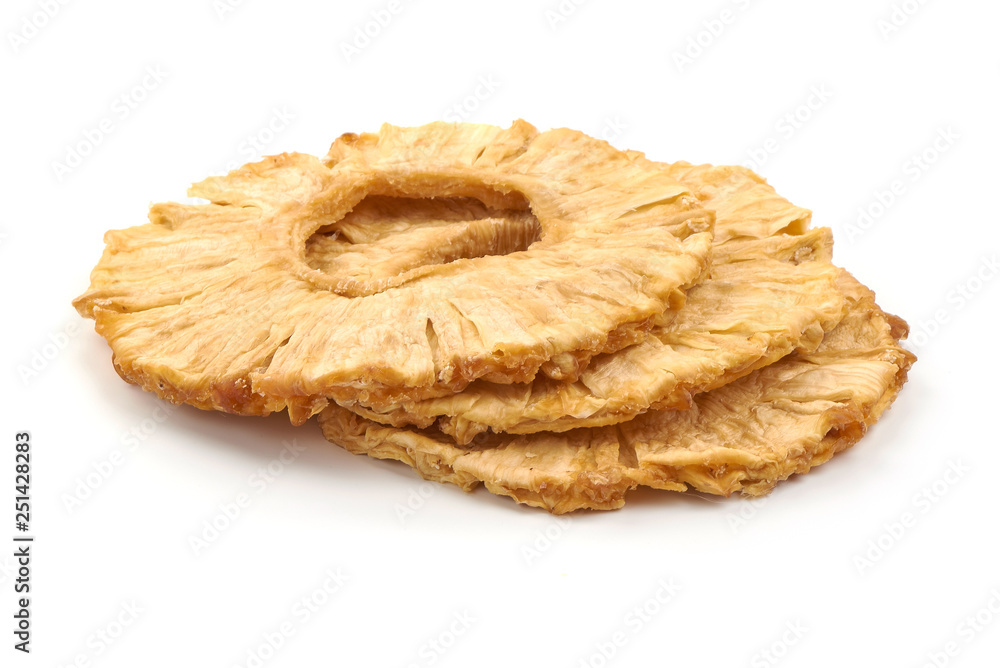 Dried candied pineapple rings, close-up, isolated on white background