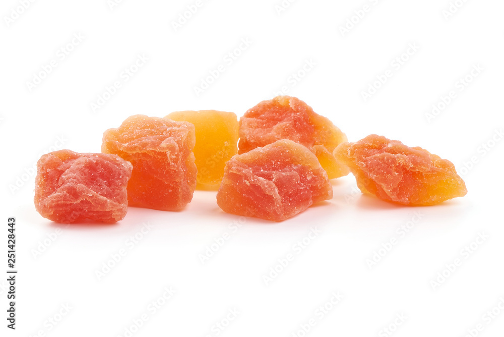 Dried pieces of papaya, close-up, isolated on white background Dried pieces of papaya, close-up, isolated on white background