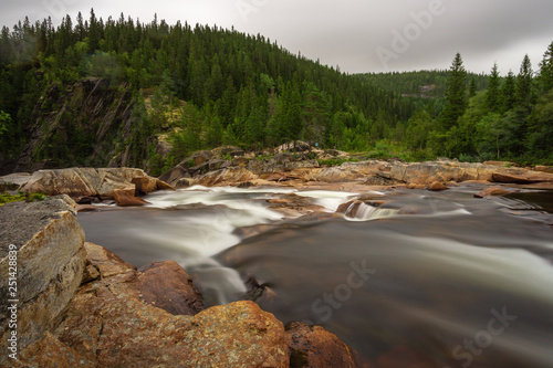 Fototapeta Naklejka Na Ścianę i Meble -  long-term recording water Brook stone rocks trees