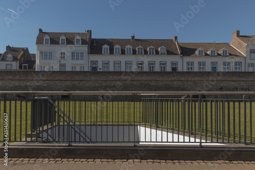 View on a fortified wall and attached houses in downtown Maastricht photo