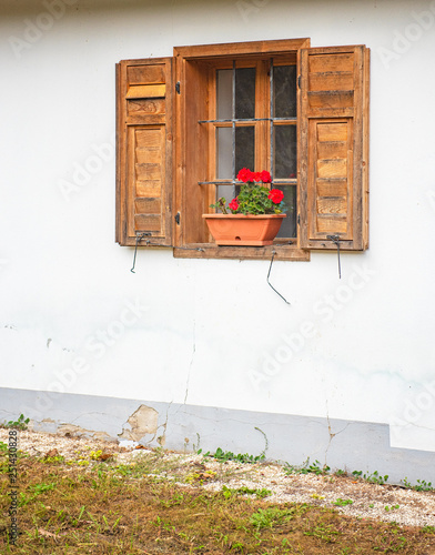 Window decorated with Geran...