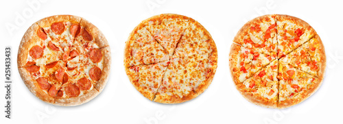 Set of pizzas: pepperone, cheese, chicken and tomatoes photo